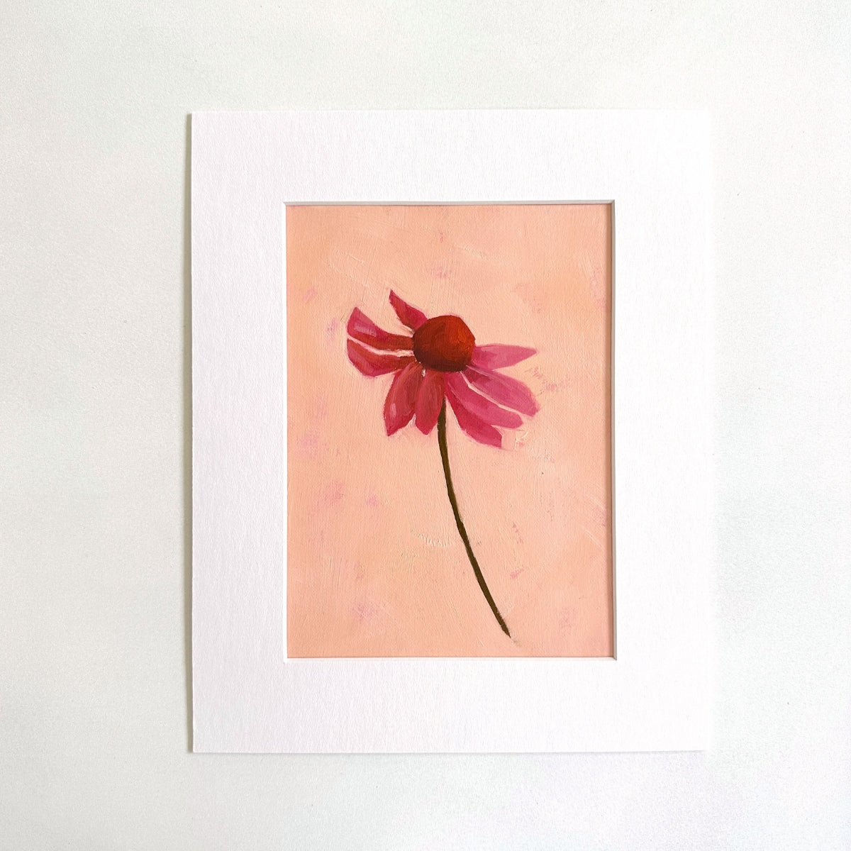 original oil painting of an echinacea flower with pink petals in a textured peachy background