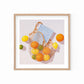 modern and contemporary fine art paper print of an original oil painting of colorful citrus fruits like lemons, orange and limes, in a string/net bag with a light blue diary reading the art of simple. The fruits, bag and diary are on a white background with strong shadows